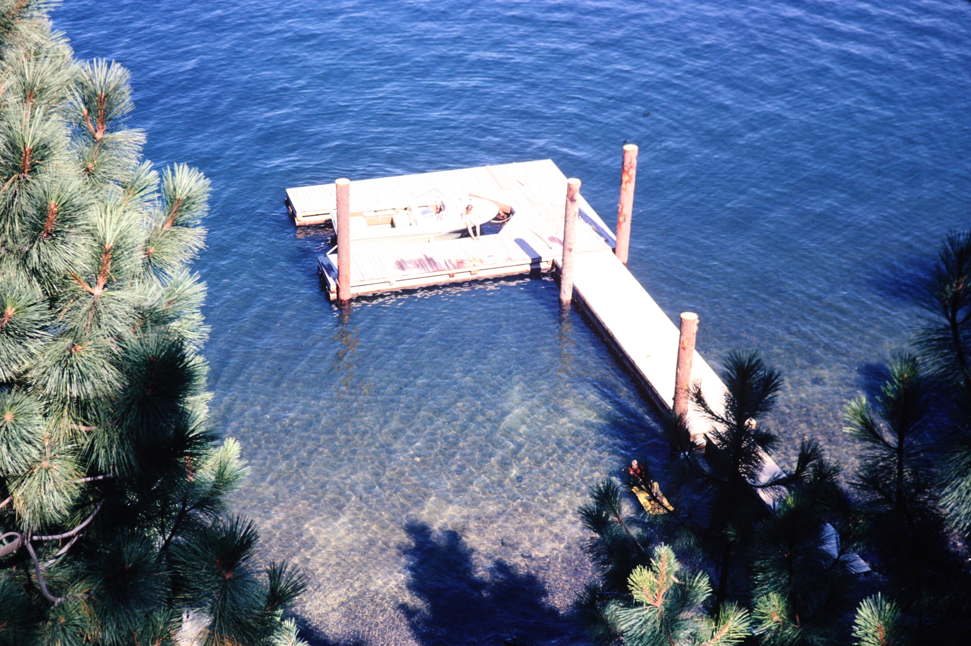 View of dock from cabin deck, Coeur d'Alene Lake, circa 1972