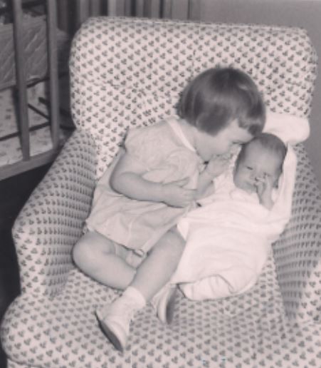 Me at 17 months, and my newborn brother
